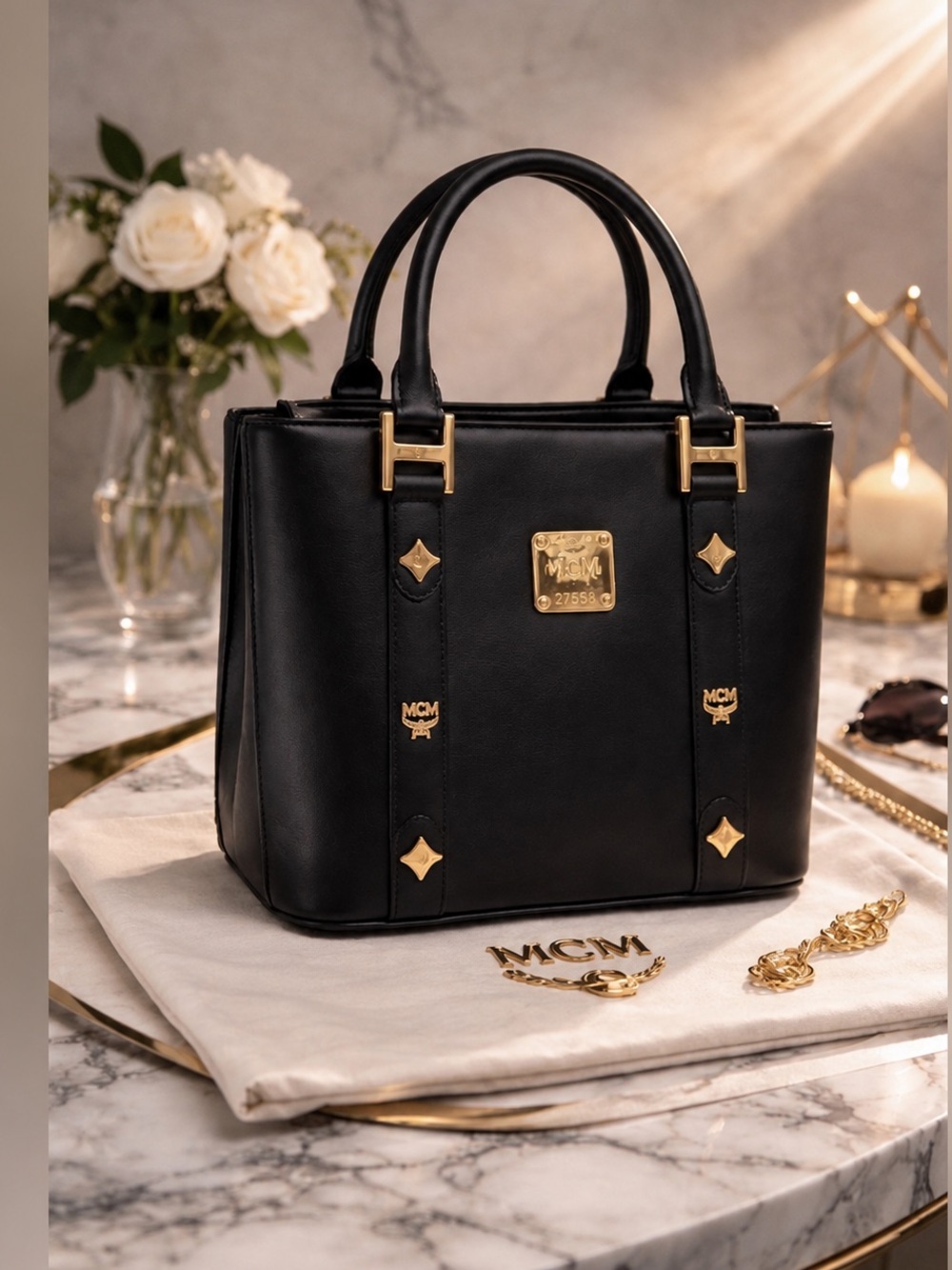 MCM Small Beautiful Black Tote with Gold Accents amazing pre-loved condition.